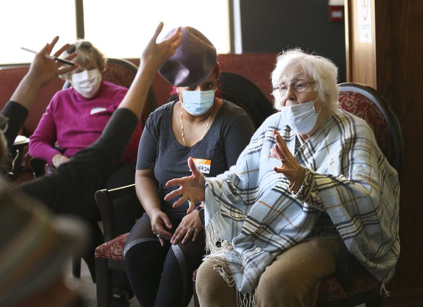 Joan Slamben, 90, catches a ball at Canadian Macedonian Place.