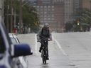 A cyclist is shown along University Avenue West in Windsor on Thursday, September 23, 2021.