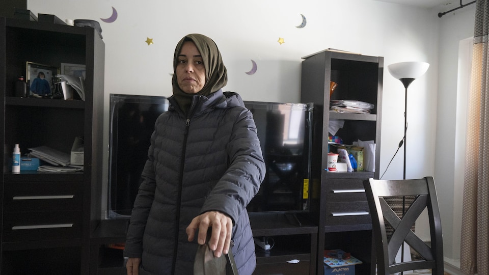 Portrait of Safia, in her home.