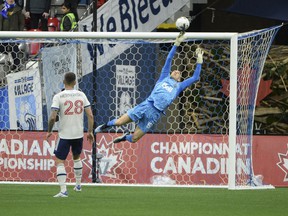 May 11, 2022;  Vancouver, British Columbia, Canada;  Vancouver Whitecaps goaltender Cody Cropper (55) reaches for the ball after a shot by the Valor FC during the first half at BC Place.  Mandatory Credit: Anne-Marie Sorvin-USA Today Sports