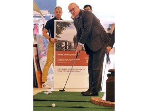 Windsor Mayor Drew Dilkens competes in a putting contest of dignitaries who participated in a Tourism Windsor Essex Pelee Island press conference on Wednesday, May 11, 2022 at the Devonshire Mall.