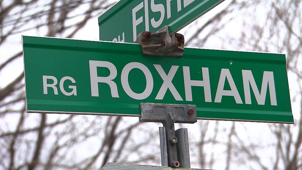 A sign reads Rg Roxham.