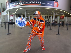 Blair Gladue, better known as Superfan Magoo on social media, torys to get Edmonton Oilers fans coming into Rogers Place pumped up as they wait for the start of Game 6 between the Oilers and Los Angeles Kings.  Taken on Thursday, May 12, 2022 in Edmonton.  Greg Southam/Post Media