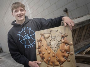 Dave Hanratty, 16, pictured with his winning piece of work on Wednesday, May 11, 2022, was a winner at an Ontario skills competition.