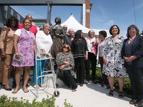 The University of Windsor unveiled a statue of abolitionist and newspaper publisher Mary Ann Shadd on Thursday, May 12, 2022. Local artist Donna Mayne created the bronze sculpture which sits at the corner of Chatham and Ferry, site of the former Windsor Star building and current home to the university's Windsor Hall.  Relatives of Mary Ann Shadd pose next to the statue.