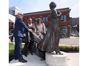 The University of Windsor unveiled a statue of abolitionist and newspaper publisher Mary Ann Shadd on Thursday, May 12, 2022. The bronze sculpture sits at the corner of Chatham and Ferry, site of the former Windsor Star building and current home to the university's Windsor Hall .  University president Robert Gordon, university director of anti-racism organizational change Marium Tolson-Murtty, center, and local artist Donna Mayne who created the statue unveil the sculpture.