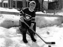 A young François Legault readies to play outdoor hockey in his hometown of Ste-Anne-de-Bellevue.