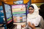 Tasnia Nabil, 14, a grade 9 student at Vincent Massey Secondary School, discusses her project titled Ferromagnetic NanoTherapy: A New Cure for Cancer at the Windsor Regional Science Technology and Engineering Fair at St. Clair College, Saturday, March 28, 2015. ( DAX MELMER/The Windsor Star)