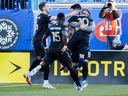 CF Montréal players celebrate a goal by Joaquin Torres (10) against Atlanta United during second half MLS soccer action in Montreal on April 30, 2022.