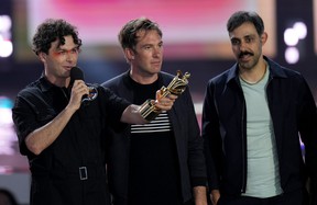 The Arkells hold up their Juno Award for Group of the Year at the awards in Toronto on Sunday, March 15, 2022. NATHAN DENETTE/THE CANADIAN PRESS