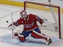 Carey Price of the Montreal Canadiens makes a blocker save against the Florida Panthers in the first period at the Bell Center in Montreal on April 29, 2022. 