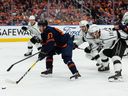 Edmonton Oilers' Connor McDavid (97) battles LA Kings' Anze Kopitar (11) during first period NHL Stanley Cup playoffs action at Rogers Place in Edmonton, on Saturday, May 14, 2022.