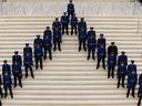 Edmonton Police Service Recruit Training Class No. 153 officers are seen during their graduation ceremony at city hall in Edmonton on May 13, 2022.