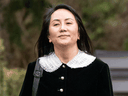 Meng Wanzhou, chief financial officer of Huawei, leaves her Vancouver home for an appearance at BC Supreme Court in April.