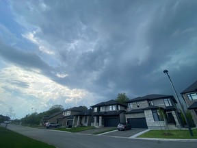 Storm clouds roll over Ottawa's west end before the heavy thunderstorm hit the region on Saturday afternoon.