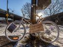 A ghost bike, a bike painted all white, was installed in Montreal, Dec. 4, 2014, at the site where Salim Aouadi, 43, died a week before. 