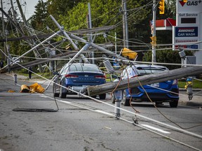 Merivale Road near Viewmount 
Drive was closed with lines down on cars.