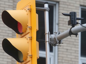 A camera device attached to traffic lights in downtown Windsor, photographed April 2021.