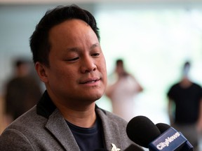 Hon Leong, with the Chinatown Transformation Collaboration Society, speaks with the media about his uncle Ban Hoang, who was killed in Chinatown, as members of Chinatown's community filled city council chambers during a discussion about the Community Safety and Well-being Strategy in Edmonton, on Tuesday, May 24, 2022. Photo by Ian Kucerak