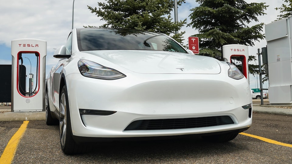 A Tesla Model Y electric car at a charging station in Medicine Hat on May 18, 2022.