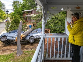 Marc-André Ouellet's Mercedes camper van was smashed by a fallen tree in his driveway in Morin-Heights on Tuesday May 24, 2022 due to the storm that passed through town over the weekend.
