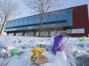 Floral and other tributes were seen in the areas around the Center culturel islamique de Québec in Quebec City in February 2017.