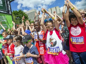 Children filled the start corral for the Kids Marathon on Tamarack Ottawa Race Weekend.  olivia 