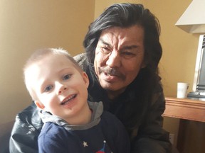 Clifford Mitchell, seen in February 2018 with his grandson Levi.