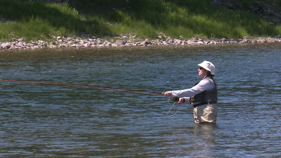 A fisherman in the Bonaventure River