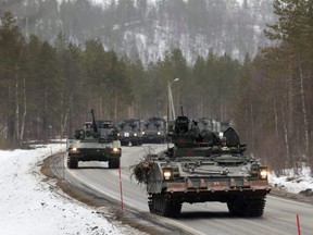 Swedish Army armored vehicles and tanks participate in a military exercise called "Cold Response 2022"gathering around 30,000 troops from NATO member countries as well as Finland and Sweden, amid Russia's invasion of Ukraine, in Setermoen, Norway, March 25, 2022.