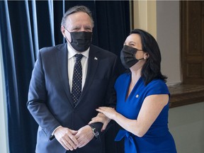 Quebec Premier François Legault is greeted by Montreal Mayor Valérie Plante before their meeting Monday, May 2, 2022 in Montreal.
