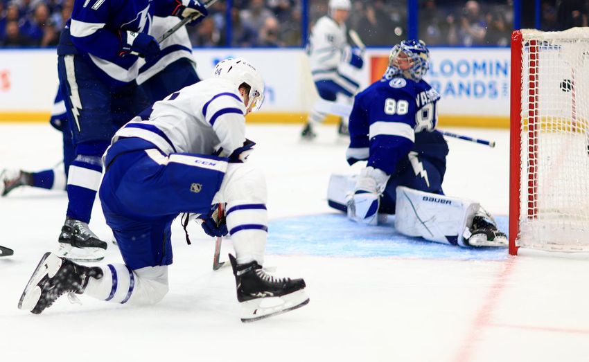 Leafs defenseman Morgan Rielly opens the scoring against Andrei Vasilevskiy with a first-period power-play goal.