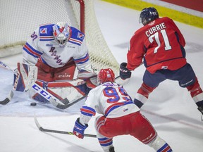 Windsor Spitfires' forward Josh Currie has his scoring attempt turned aside by Kitchener Rangers' goalie Pavel Cajan on Saturday at the WFCU Centre.