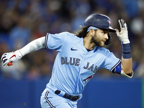 Bo Bichette of the Blue Jays runs the bases after hitting a home run against the Houston Astros at Rogers Center on May 1, 2022 in Toronto.