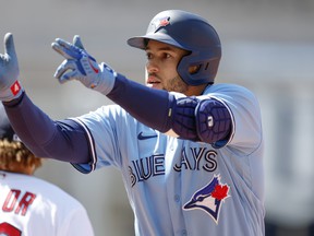 George Springer of the Toronto Blue Jays celebrates his RBI single in the fourth inning of game one of a doubleheader against the Cleveland Guardians at Progressive Field on May 07, 2022 in Cleveland, Ohio.  The Blue Jays defeated the Guardians 8-3.