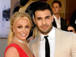 Britney Spears and Sam Asghari arrive at the premiere of Sony Pictures' "One Upon A Time...In Hollywood" at the Chinese Theater on July 22, 2019 in Hollywood, Calif.