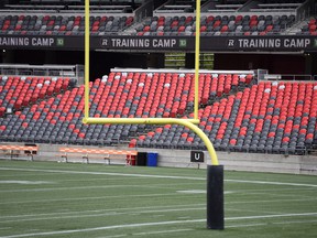 The field is empty, but the stadium screens still show signs for the Ottawa Redblacks' training camp at TD Place, home of the Ottawa Redblacks, in Ottawa on Tuesday, May 17, 2022.