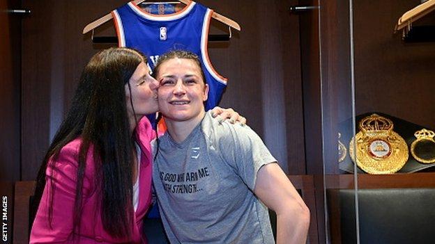 Katie Taylor with mother Bridget after her world title defence against Amanda Serrano