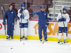 Canucks' assistant coaches Kyle Gustafson (left) and Brad Shaw with players at team practice at Rogers Arena in Vancouver, BC Wednesday, October 6, 2021. Photo by Jason Payne/ PNG) (For story by Patrick Johnston) ORG XMIT: canucks [PNG Merlin Archive]