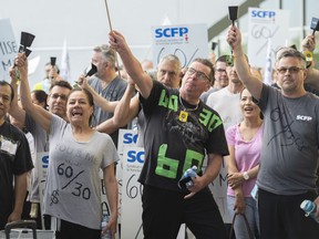 Croupiers protest outside the Casino in Montreal, Saturday, May 14, 2022.