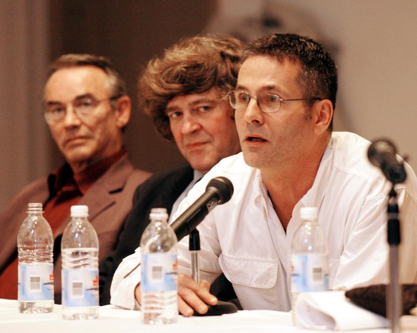 David Milgaard, far right, answers questions during a panel discussion for the wrongfully accused in Windsor, Ont., in 2004. Later in his life, Milgaard helped raise awareness about wrongful convictions and demanded action on the way Canadian courts review convictions.  Steven Truscott, who was wrongfully accused of rape and murder in 1959, and lawyer James Lockyer look on to Milgaard's left.