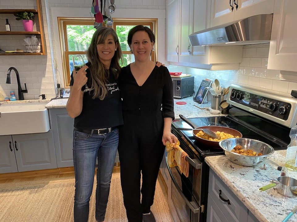 Tamara Gimazova and Michelle Julien cooking. 