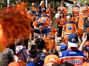Mayor Amarjeet Sohi leads a cheer during an Edmonton Oilers fan rally held at Sir Winston Churchill Square to cheer the Oilers' playoff trip in Edmonton on Tuesday, May 24, 2022. The Oilers face the Calgary Flames in Game 4 of the Battle of Alberta series at Rogers Place tonight.