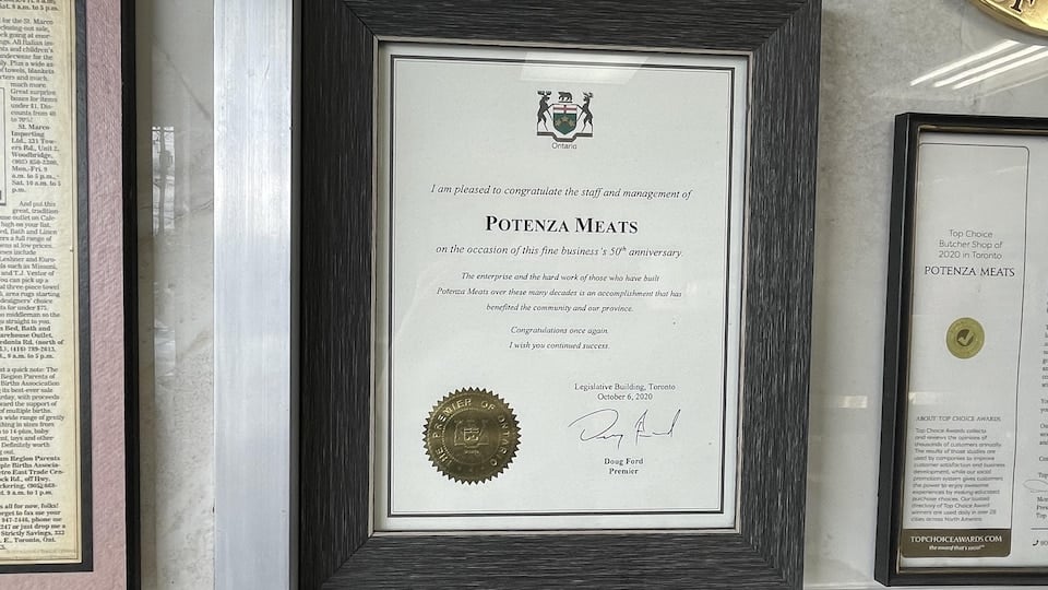 A certificate to mark the company's 50th anniversary, signed by Doug Ford.