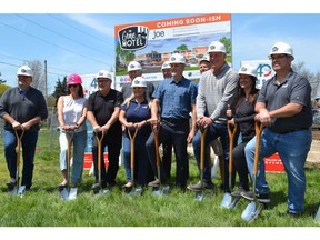 Owners Jennifer and Jim Flynn, along construction representatives, Essex councilors and Mayor Richard Meloche took part in a ceremonial ground-breaking Tuesday, May 10, 2022, for the Grove Retro Motel, a -million development in the village of Colchester.  Excavation is underway and the motel is expected to be operational in the spring of 2023.