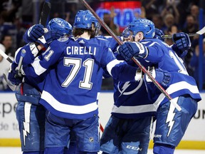 Lightning right wing Nikita Kucherov (86) is congratulated after scoring a goal against the Maple Leafs during the third period of Game 6 of the first round of the 2022 Stanley Cup Playoffs at Amalie Arena in Tampa, Fla., Thursday, May 12, 2022 .