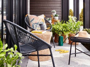 Small scale and open-air-style furnishings are perfect for small outdoor spaces.  Black Outdoor Conversation Chair, , www.winners.ca