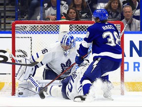 Jack Campbell of the Toronto Maple Leafs stops a shot from Brandon Hagel of the Tampa Bay Lightning in the third period during Game 3 at Amalie Arena on May 06, 2022 in Tampa, Florida.