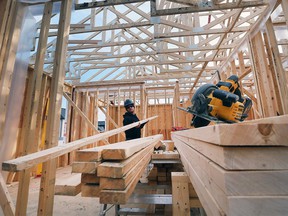 Windsor is no longer Canada's jobless capital, according to Statistics Canada.  In this March 10, 2022, file photo, Jordan Ellis, a framer with JS Ellis Construction, works on a single family housing build in the 1300 block of Clearwater Avenue in Windsor.