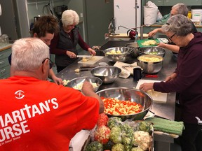 Volunteers prepare food for people affected by the BC floods in 2021.
